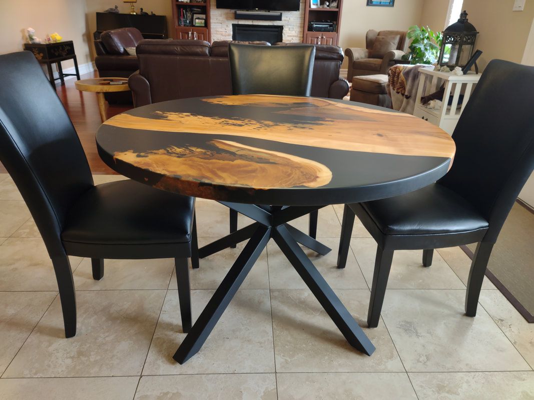 Salvaged wood and epoxy river table with steel spider base, black epoxy river table, river table with black epoxy, mape and black epoxy river table, round river table, round epoxy table, round epoxy river table